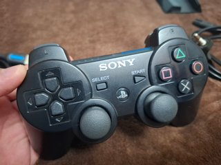 PlayStation 3 Slim con M.A.G.I.A + Juegos