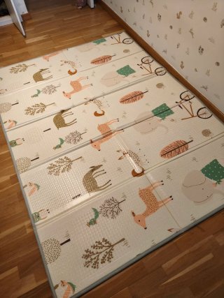 Alfombra de juego infantil con animales