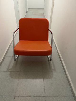 Sillón Mecedora Naranja y Acero