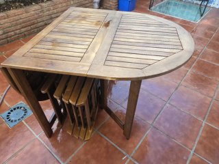 Mesa de terraza plegable con 6 sillas de madera