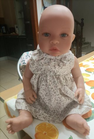 Bebé realista vestido