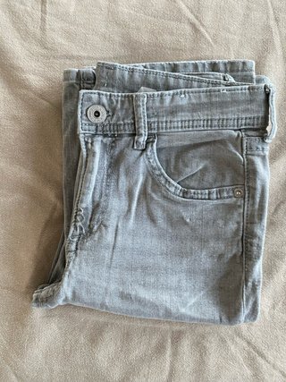 Vaqueros boot cut tiro bajo grises