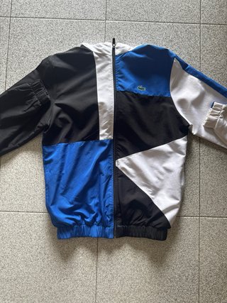 Giacca a vento Lacoste blu e bianca