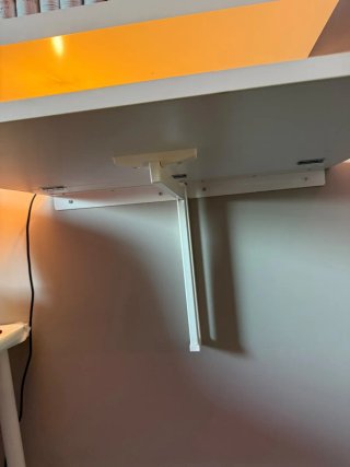 Mesa plegable pared madera blanca