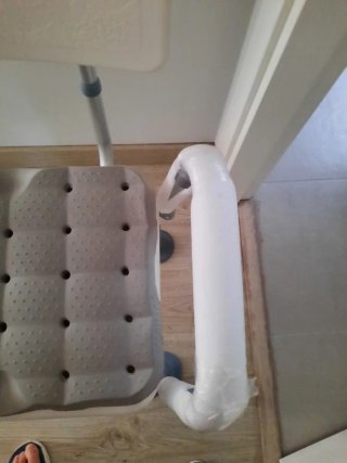 Silla de ducha con respaldo y reposabrazos