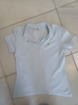 Polo Lacoste Celeste Mujer