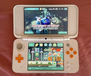 Nintendo New 2DS XL Blanca y Naranja