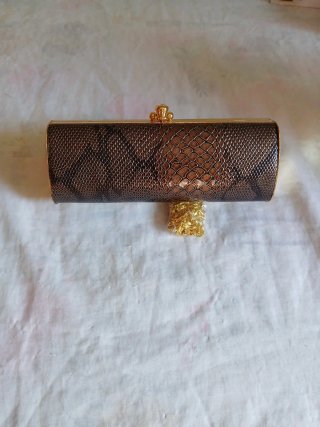 Bolso de mano tipo clutch