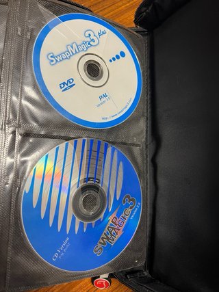 Funda Woxter con 45 backups PS2 + disco azul