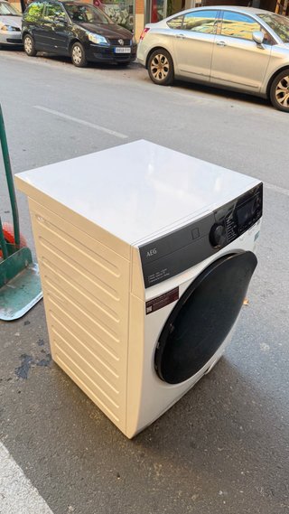 Lavadora/Secadora AEG LWR981601C con golpe inferio