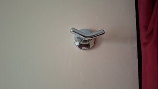 Colgador de pared doble plateado