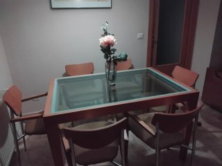 Mesa de comedor extensible madera y cristal