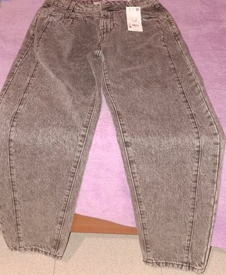 Jeans donna grigi con etichetta