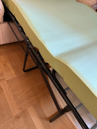 Sofá cama beige de tela