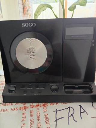 Reproductor de música y dos altavoces