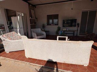 Conjunto sofá y sillones de mimbre para terraza