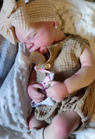 Reborn silicona niña 48cm piel blanquita