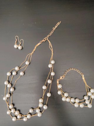 Parure collana, bracciale e orecchini perla