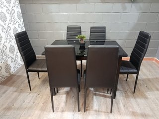Mesa de Cristal y 6 Sillas de Polipiel