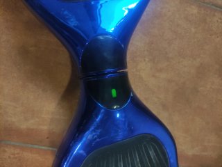 Hoverboard azul con accesorio