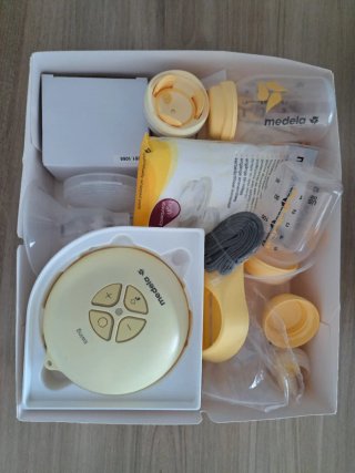 Sacaleches Medela Swing y Esterilizador Jané