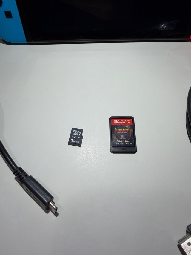 Nintendo Switch V2 completa + Jumanji e 32gb