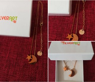 Collana in acciaio con luna e stelle