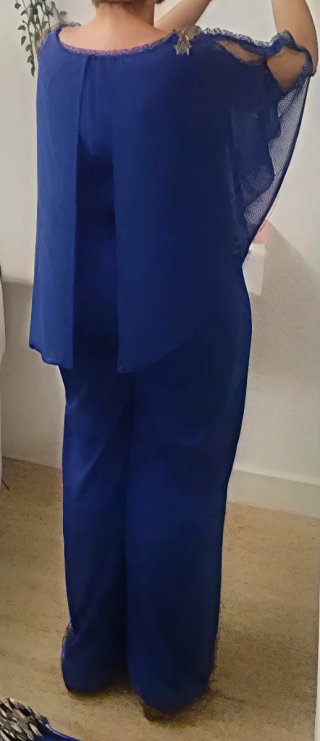Mono fiesta azul. Elástico y con capa.