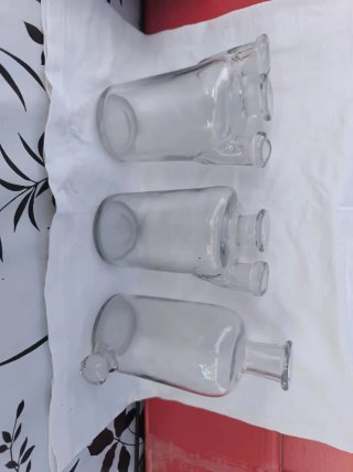 3 Vecchie Bottiglie di Vetro Wolf