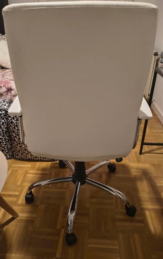 Silla giratoria de polipiel blanca