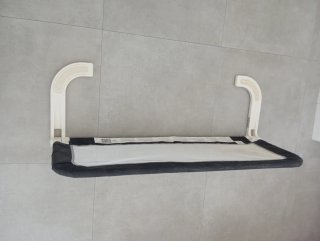 Barra protectora anti caídas para cama.