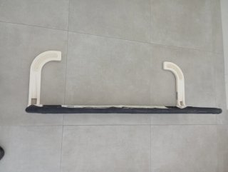 Barra protectora anti caídas para cama.
