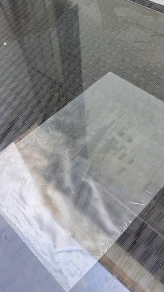 Mesa de exterior ratán con tapa de cristal