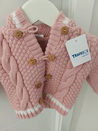 Chaqueta tejida rosa para bebé