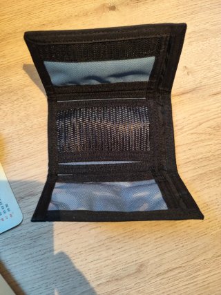 Cartera Reebok azul y negra
