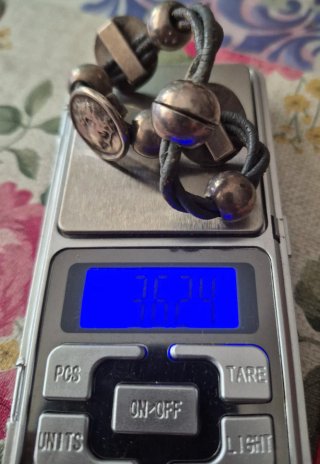 Bracciale in Argento 925 con Monete e Sfere