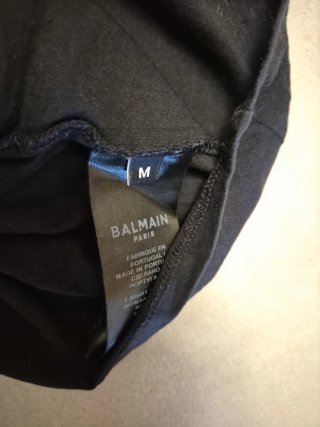 T-shirt Balmain nera con logo oro