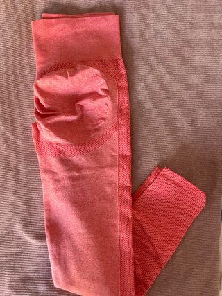 Mallas de gimnasio naranjas y rosas