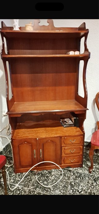 Mueble de madera con estantes y cajones