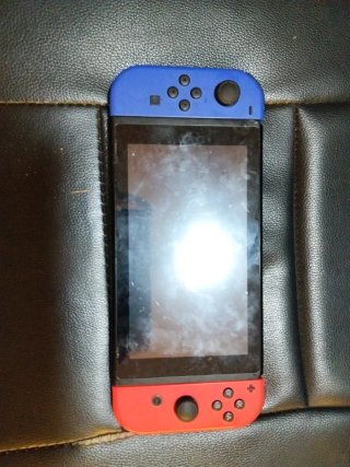 Nintendo Switch con Funda y 12 Juegos o cambio G2