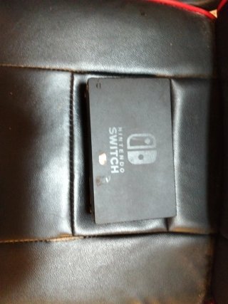 Nintendo Switch con Funda y 12 Juegos o cambio G2