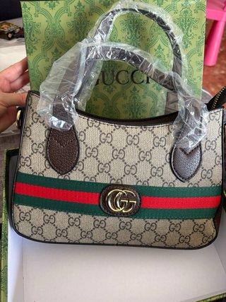 Bolso Gucci GG Supreme con banda