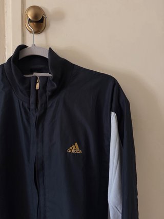 Chaqueta deportiva Adidas azul marino y celeste