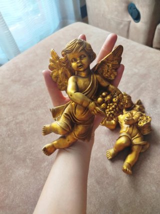Figuras ángeles dorados envejecidos