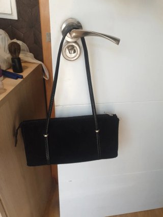 Bolso de mano negro de vestir