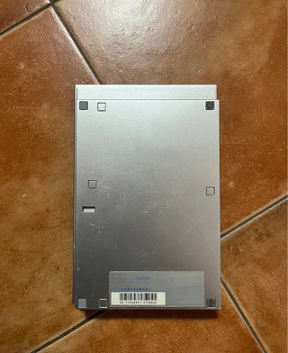 PS2 Slim Silver + 5 Giochi + Controller
