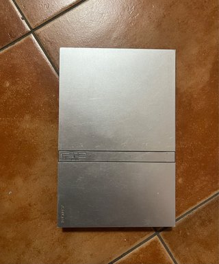 PS2 Slim Silver + 5 Giochi + Controller