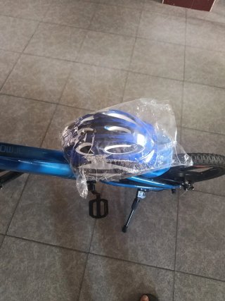 Bicicleta eléctrica infantil azul seminueva