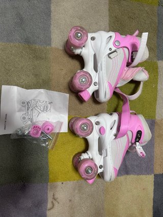 Patines 4 ruedas blancos y rosas