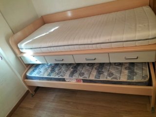 Cama nido doble con cajones.
